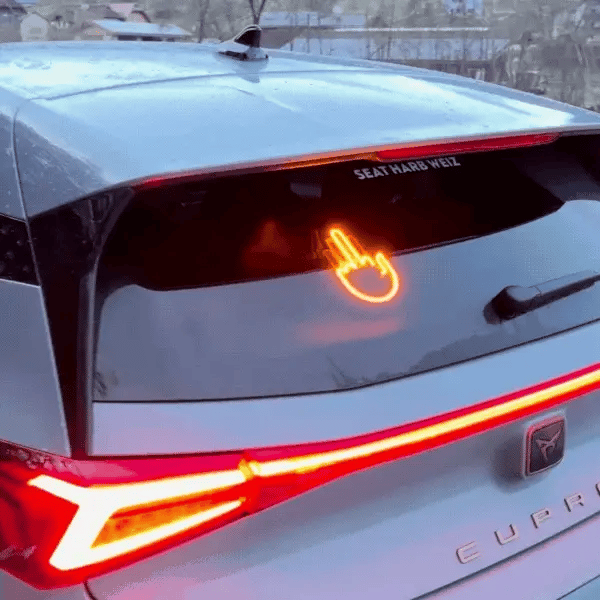 LED gesture hand mounted on a vehicle rear window